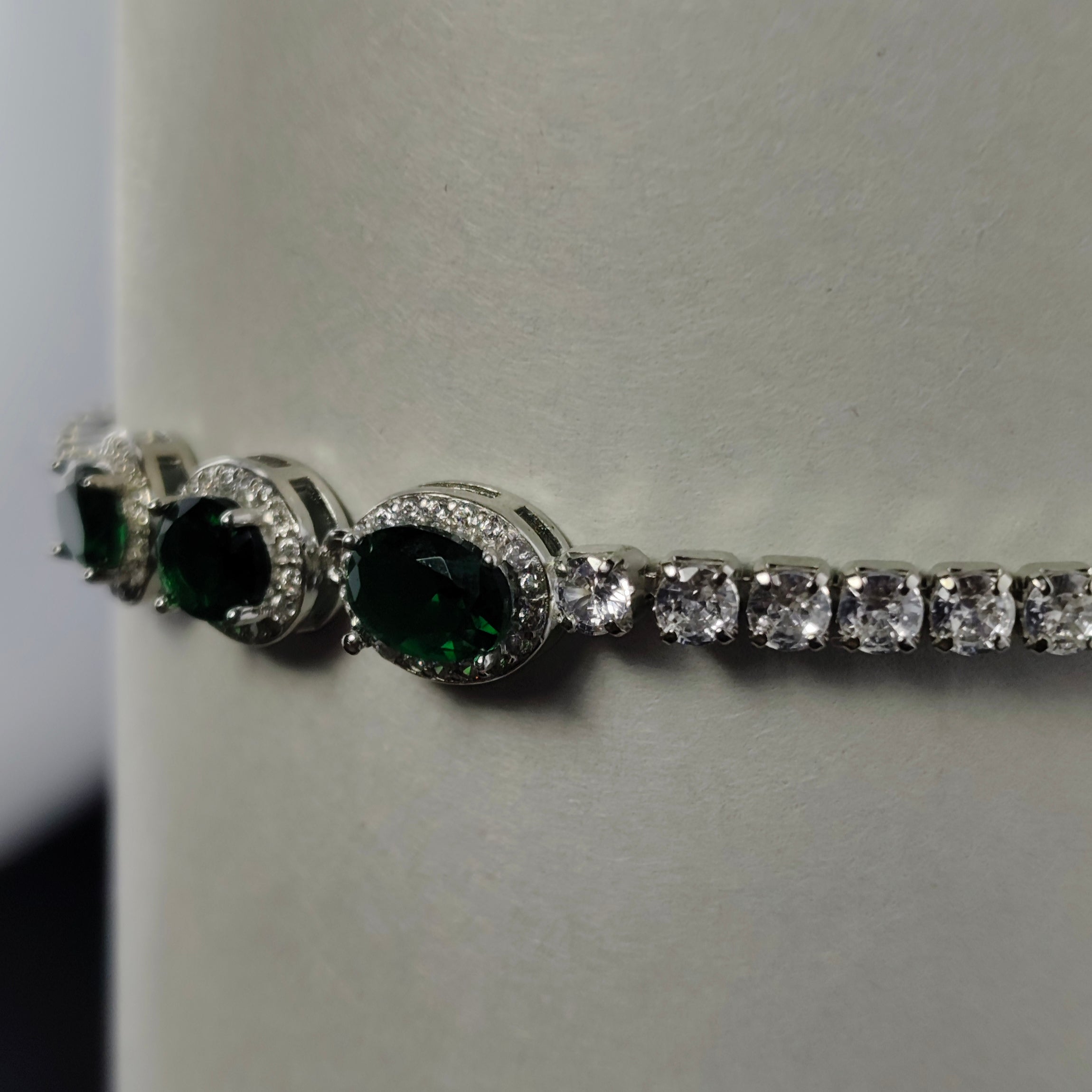 DELICATE SILVER BRACELET WITH EMERALD AND DIAMOND ACCENTS