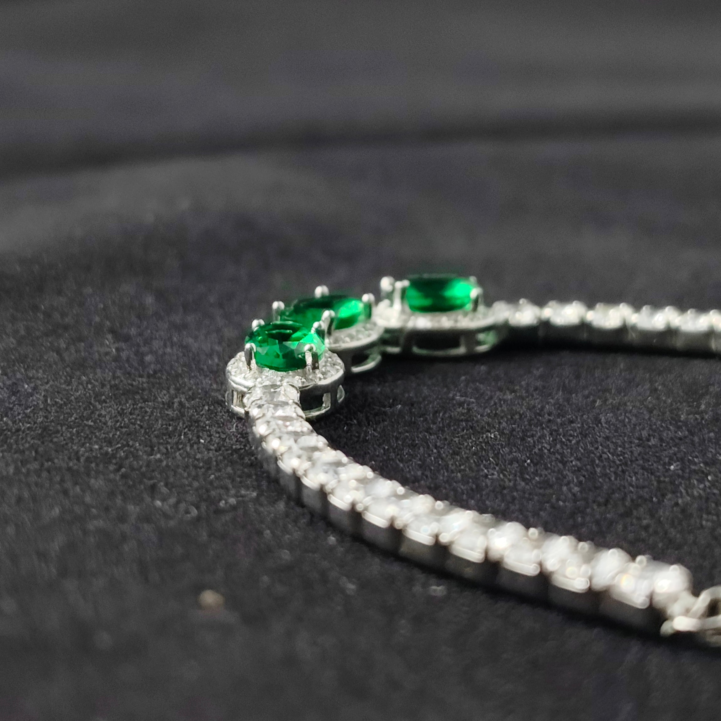 DELICATE SILVER BRACELET WITH EMERALD AND DIAMOND ACCENTS
