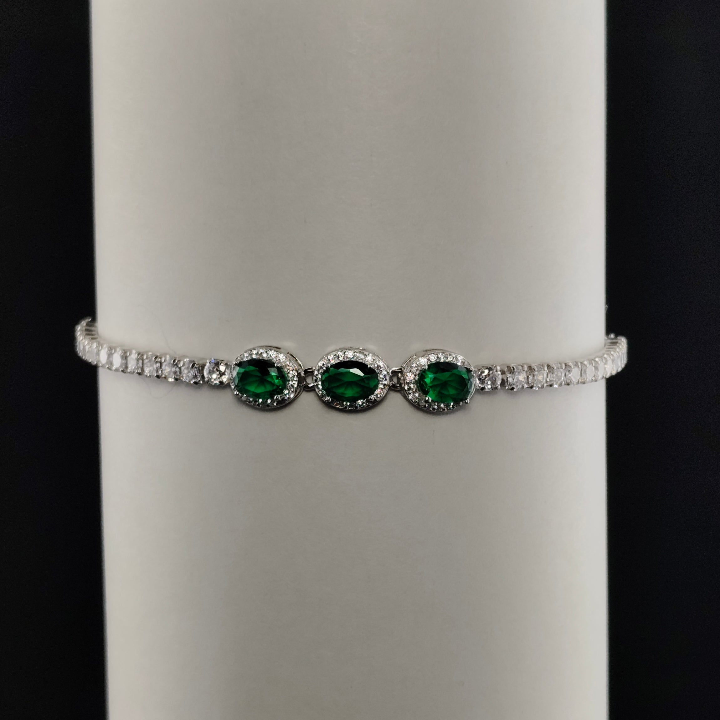 DELICATE SILVER BRACELET WITH EMERALD AND DIAMOND ACCENTS